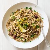 A vibrant serving of Olive Tapenade Pasta with al dente spaghetti, olive tapenade, and garlic, ready to enjoy.