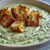 Close-up of blended Cauliflower and Broccoli Soup with sautéed onions, carrots, and celery.