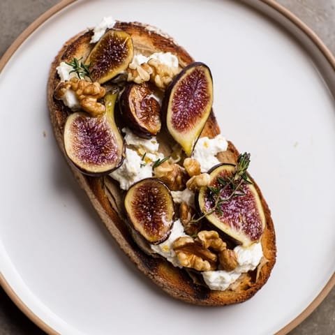 Delectable Royal Tapestry, a beautiful appetizer, showcases layers of pâté and sweet figs, ready to be enjoyed.