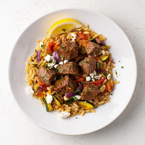 Imagine tender lamb and orzo in a vibrant Smoky Mediterranean Lamb and Orzo Supper dish.