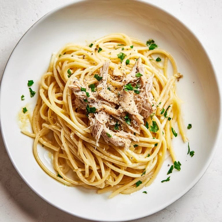 Creamy Simple Garlic Butter Bucatini features perfectly cooked bucatini tossed in aromatic garlic butter sauce.